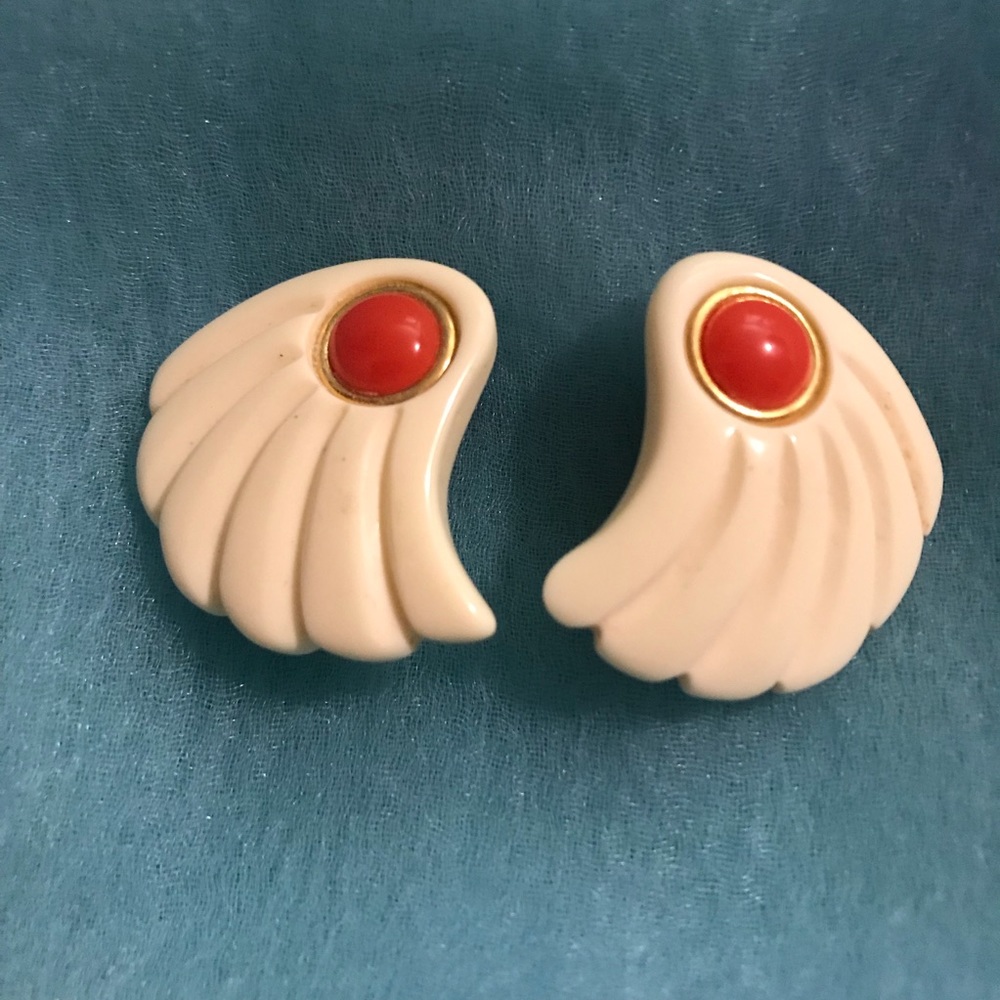 Vintage white plastic clip on earrings